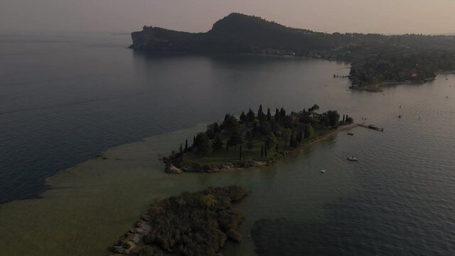 Aerial view on Rocca di Manerba, San Biagio small island on lake Garda, Italy