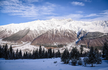 Fototapeta na wymiar The Caucasus in winter is covered with snow around the village of Ushguli. World heritage village In Georgia