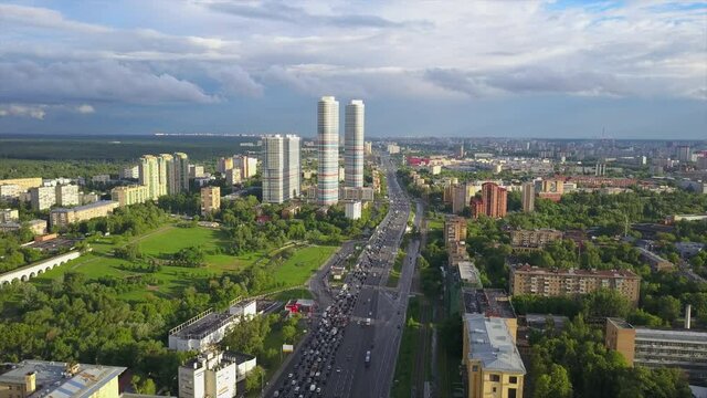 sunny day moscow cityscape traffic prospect mira aerial flight over panorama 4k russia