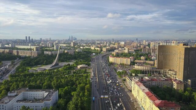 sunny day moscow cityscape traffic prospect mira aerial flight over panorama 4k russia