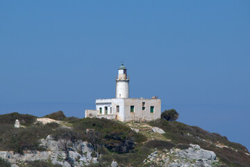 Fototapeta na wymiar beautiful lonely lighthouse, Skiathos island, Greece