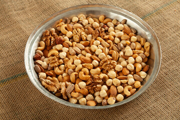 mixed nuts in copper plate