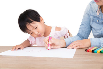 Fototapeta na wymiar Young mother or preschool teacher patiently teaching children to draw