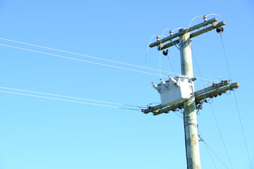 Fototapeta na wymiar Power poles and power lines 