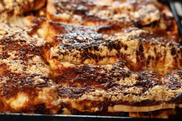 Freshly baked lasagna in baking tray. Making Lasagna Bolognese Series.