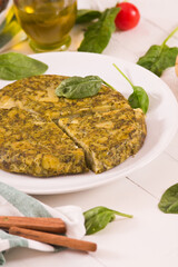 Spanish omelette with spinach.