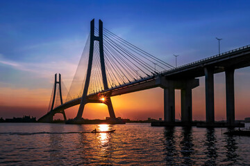 Fototapeta na wymiar Vam Cong Bridge in the beautiful afternoon