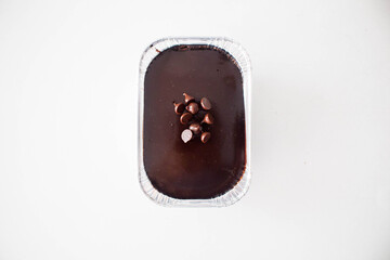 Chocolate bakery cake close-up with white background
