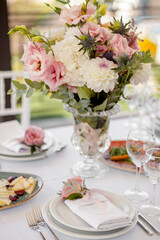 Wedding table with flowers for the newlyweds