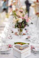 Wedding table with flowers for the newlyweds