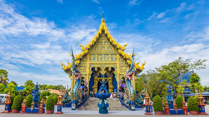 Fototapeta na wymiar Wat Rong Seur Ten or Blue Temple is a famous temple and is a major tourist attraction of Chiang Rai Province, Thailand.