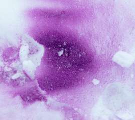 Purple paint on the snow in winter.