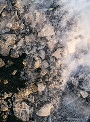 Broken ice on the ground as a background.