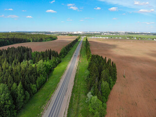 Aerial view of the road among the fields (Kirov, Russia)