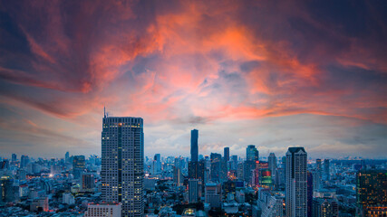 Fototapeta na wymiar Aerial view Bangkok city on twilight with colorful sky.
