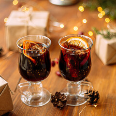 Glass mugs of glintwine with craft presents