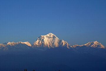 Nature himalaya rang mountain view of closeup Mt. Dhaulagiri massif.Dhaulagiri I is the seventh highest mountain in the world at 8,167 metresas seen from Poon Hill, Nepal - trekking route to Ghorepani