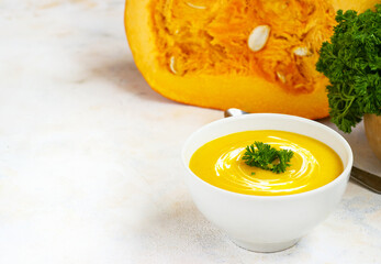 cream pumpkin soup on a light background