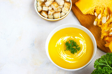 cream pumpkin soup on a light background pumpkin cream soup on a light background with croutons