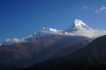 Nature Landscape of Top of Mt. Machapuchare is a mountain in the Annapurna Himalayas of north central Nepal seen from Poon Hill, Nepal - trekking route to ABC - Adventure Backpacking outdoor 