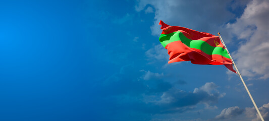 Beautiful national state flag of Transnistria with blank space. Transnistria flag on wide background with place for text 3D artwork.