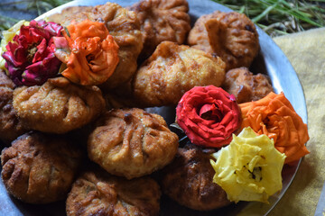 Modak or sweet fried mo-mos ,it is a traditional and popular Indian sweet dish made during the Ganpati festival in India