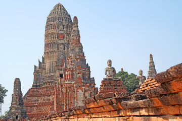Sculpture of Ancient old pagoda and Big Buddha at Wat Chai Wattanaram is Famous Landmark old History Buddhist temple in Ayutthaya , Thailand - Culture Travel Sightseeing Asia                        