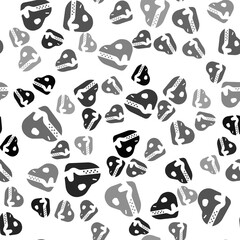 Fototapeta premium Black Dinosaur skull icon isolated seamless pattern on white background. Vector.