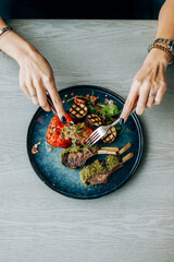 Ribs with wine on a stand