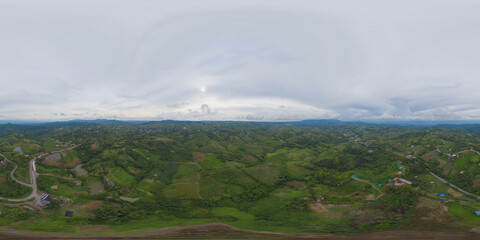 360 panorama by 180 degrees angle seamless panorama of aerial top view of green Mountain hill....