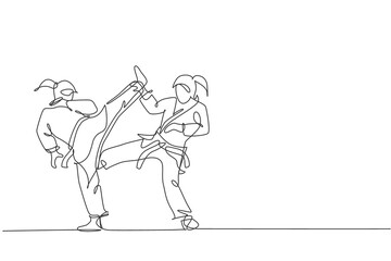 One continuous line drawing of two young talented karateka girls train pose for duel fighting at dojo gym center. Mastery martial art sport concept. Dynamic single line draw design vector illustration