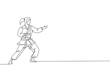 One continuous line drawing of young talented karateka girl train pose for duel fighting at dojo gym center. Mastering martial art sport concept. Dynamic single line draw design vector illustration