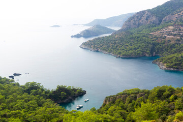 Fototapeta na wymiar Beautiful bay in the Mediterranean Sea on the Turkish or Greek seaside. Nature and the Mediterranean