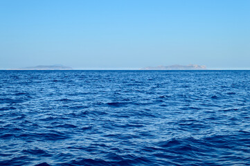 Obraz premium Seascape in Egadi Archipelago, Favignana and Levanzo visible on the Horizon line