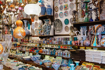 Souvenirs and gifts from Turkey. Ceramics, lamps and decor on a market counter in Istanbul.