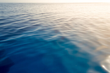 Ocean water surface at sunset time