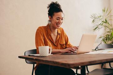 Woman enjoying working from home