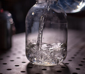 visual experiments in physics and chemistry from the school curriculum.  equipment for experiments. school laboratory. Gas mixer. Stylized photo. complex of equipment in operation. Selective focus. Sc