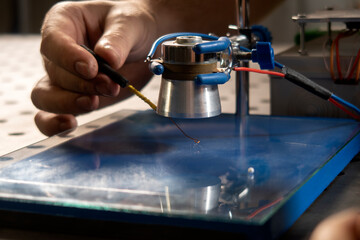 visual experiments in physics and chemistry from the school curriculum.  equipment for experiments. school laboratory. Gas mixer. Stylized photo. complex of equipment in operation. Selective focus. Sc