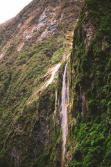 Amazing waterfall Milford Sound in New Zealand.