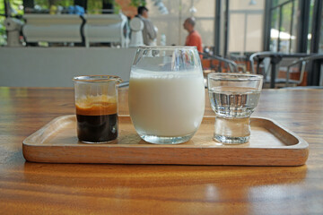 Drink scene - Ice Coffee Latte - separate Coffee and milk at coffee cafe                                