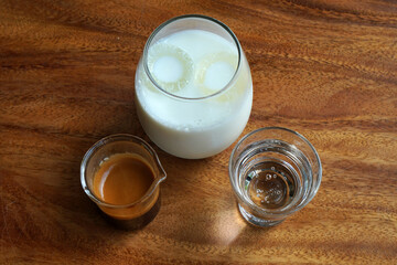 Drink scene - Ice Coffee Latte - separate Coffee and milk at coffee cafe                                