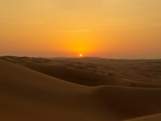 Fototapeta na wymiar Romantic Dubai Desert Sunset, United Arab Emirates