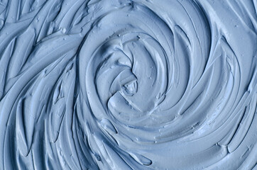 Light blue bentonite facial clay (alginate mask, face cream, body wrap) texture close up, selective...