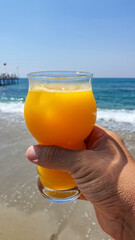 A glass of water of orange juice 