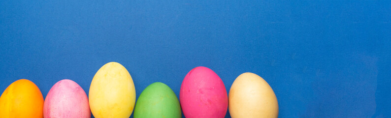 selective focus. Painted with food dyes, chicken eggs for the holiday of light Easter