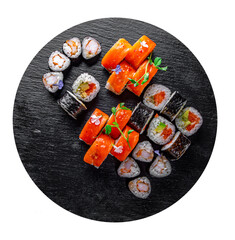 set of sushi roll with salmon, avocado, cream cheese, cucumber, rice, caviar, eel, tuna in black plate isolated on white background