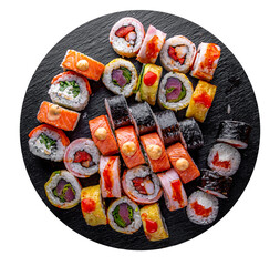 set of sushi roll with salmon, avocado, cream cheese, cucumber, rice, caviar, eel, tuna in black plate isolated on white background