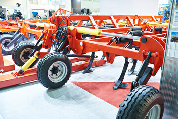 Fototapeta na wymiar Universal cultivator with spring struts at exhibition