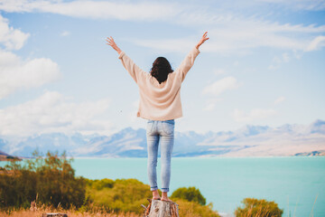 Fototapeta premium Happy woman with hands up